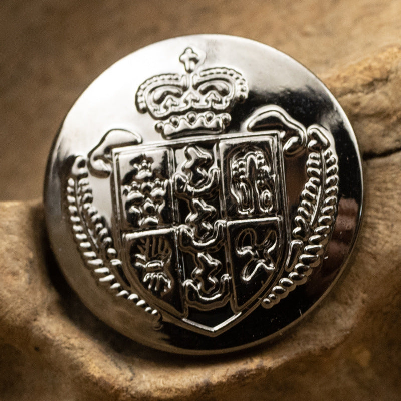 Crown crest shield metal shank button, black nickel finish, close-up 20mm