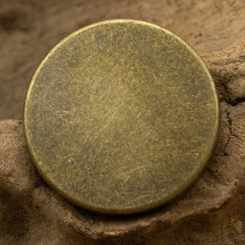 Round flat metal button with shank, bronze finish