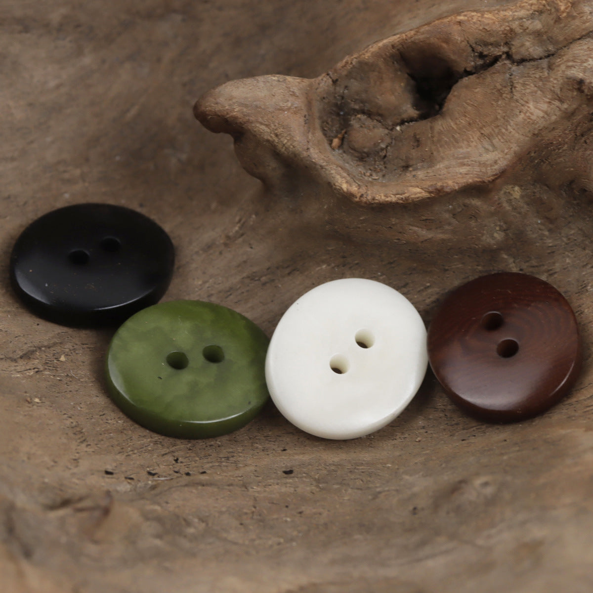 Charred two-hole oval corozo buttons in black, green, white, and wine, 10pcs