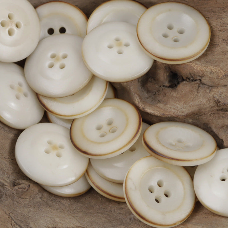 Palm nut corozo buttons, 4-hole, natural white/cream tone with light brown edges