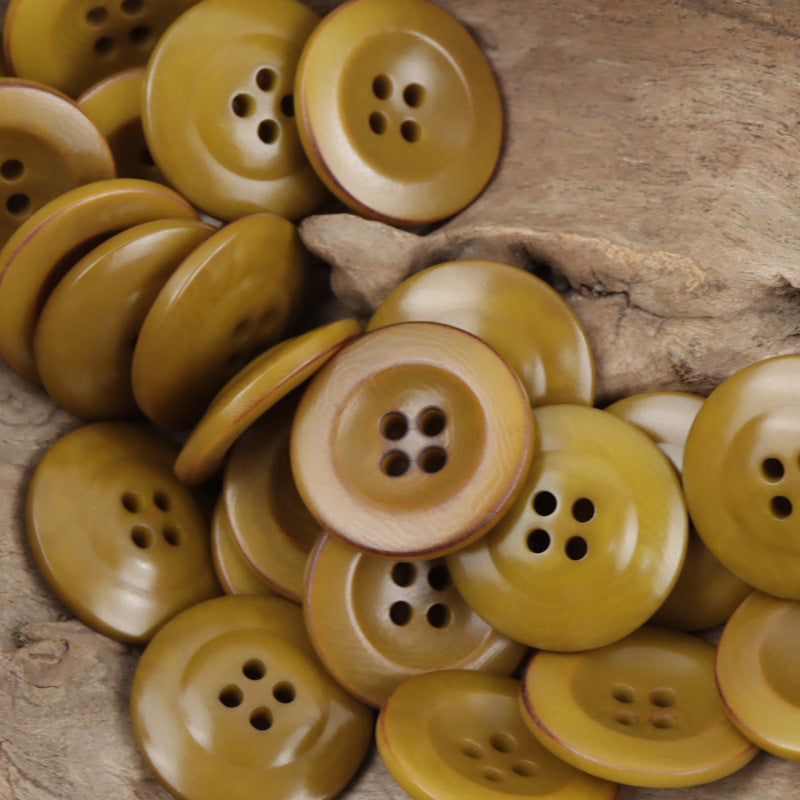 Palm nut corozo buttons, 4-hole, mustard and honey-yellow tones with dark hole backing
