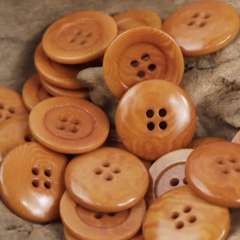 Orange tagua nut buttons, 4-hole round style