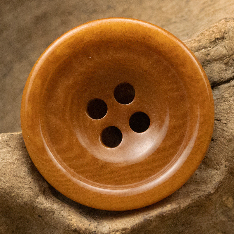 Reddish-brown 4-hole button, round vintage style