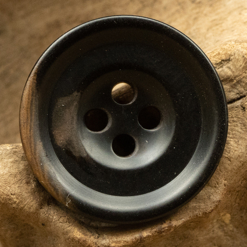 Black nut button, 4-hole for sweater or cardigan