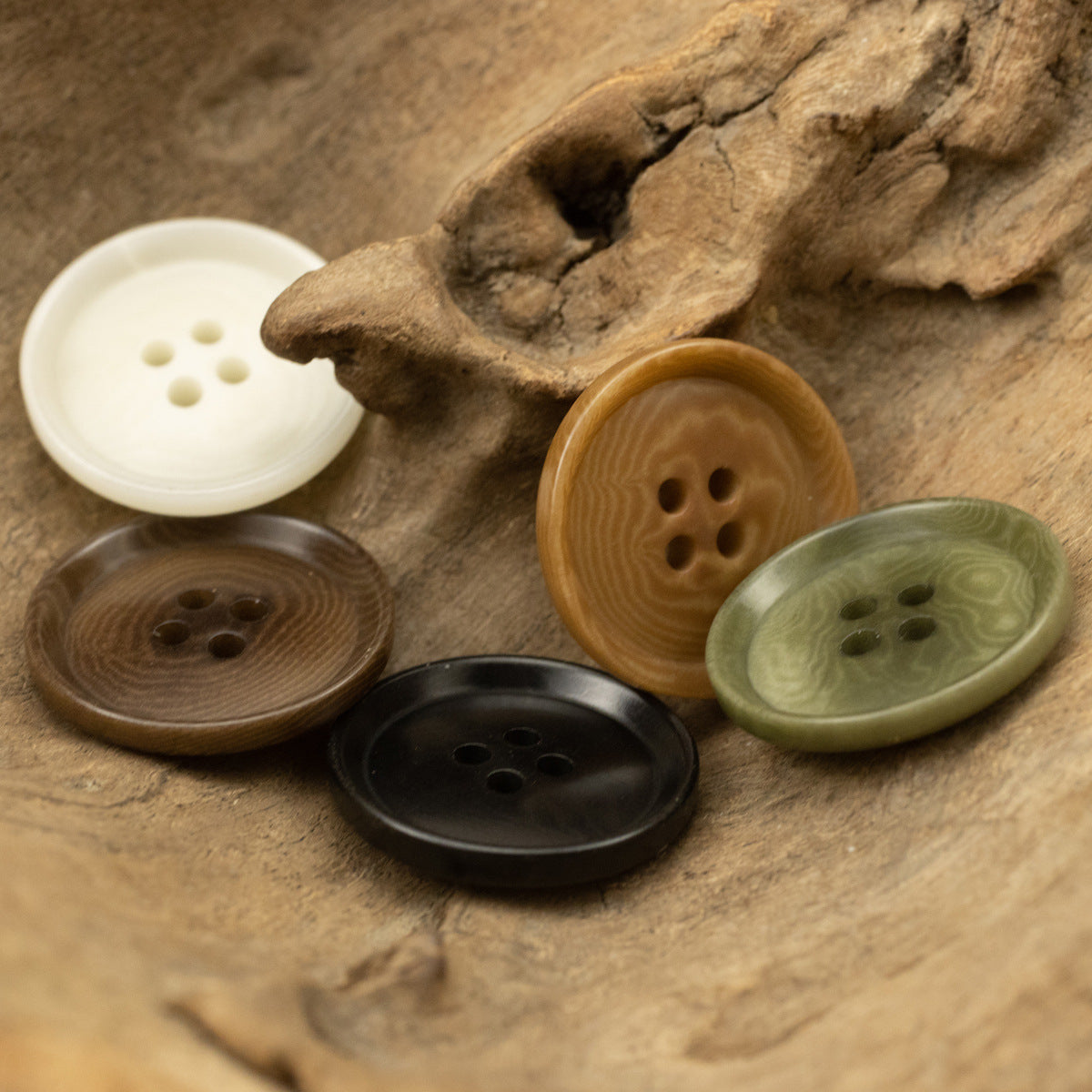 Four-hole tagua nut buttons assortment: white, olive, brown and dark