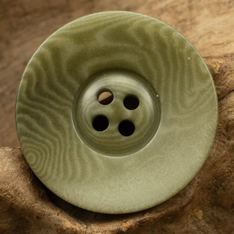Vintage wide-edged fruit button, olive green with four holes, round
