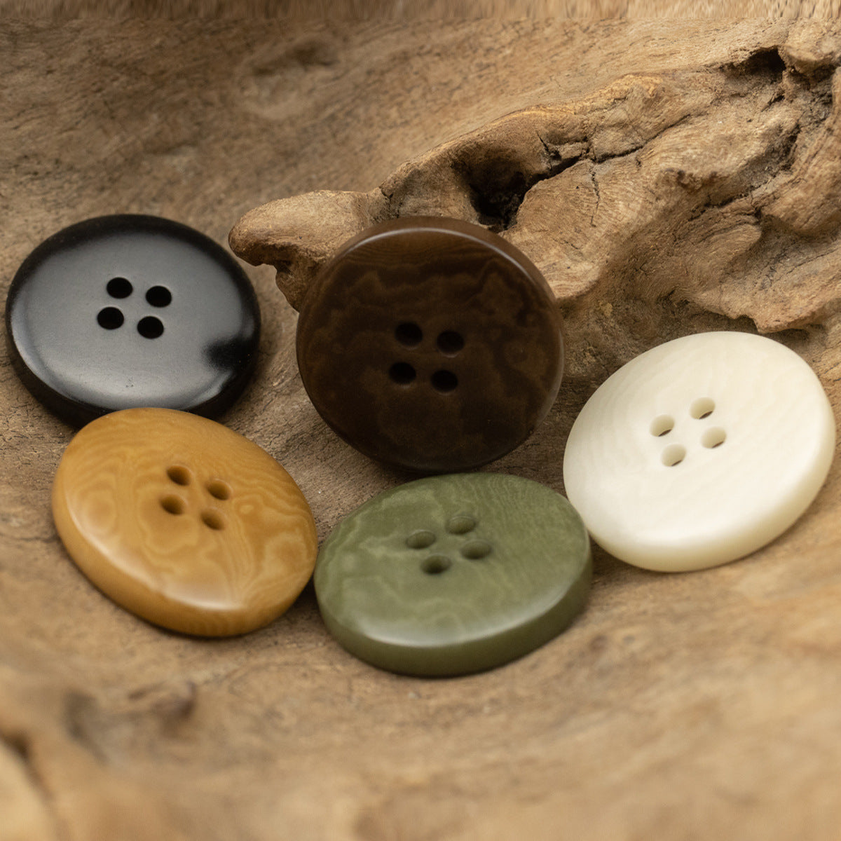 Vintage nut buttons, assorted colors: dark gray, brown, tan, olive green, off-white, 4-hole