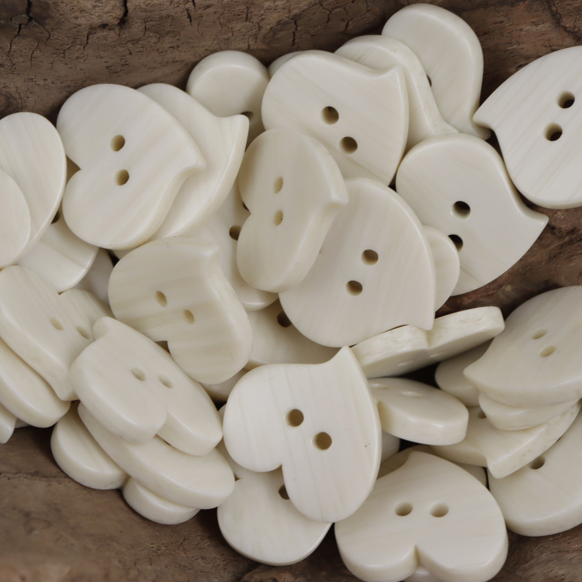 Heart-shaped resin flat buttons, two-hole, beige