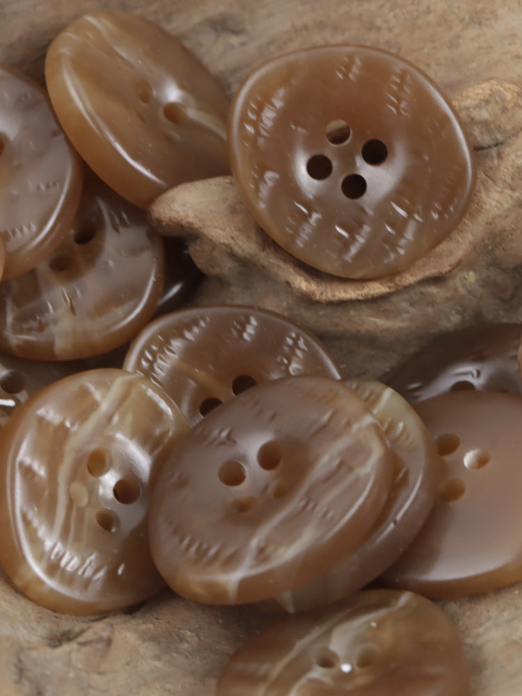 Coffee-brown resin buttons with irregular uneven surface and 4-hole design