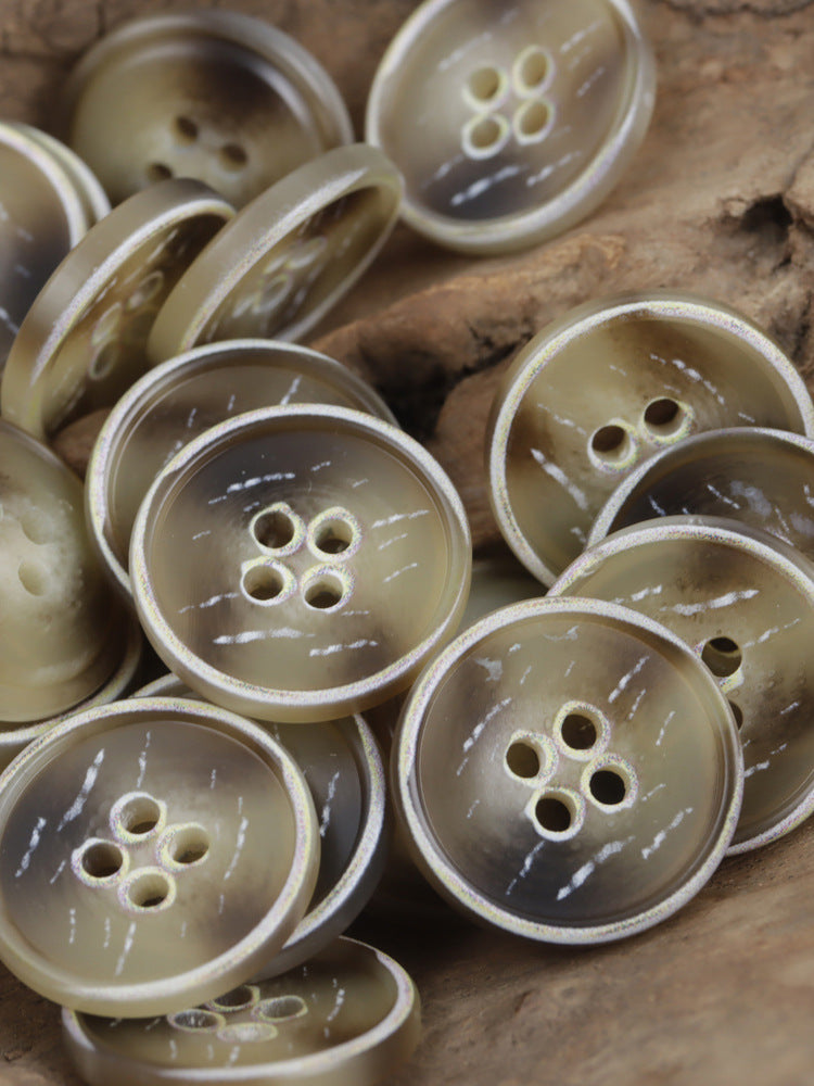Assorted light resin four-hole buttons, glossy, 15–28 mm size range