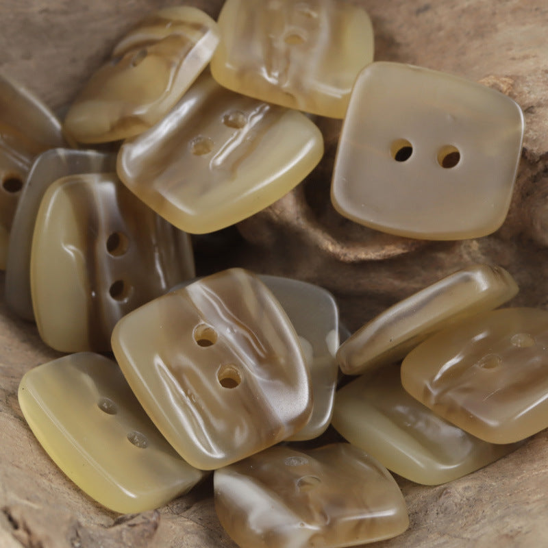 Trapezoidal 2-hole resin buttons with uneven surface, light beige and tan pile