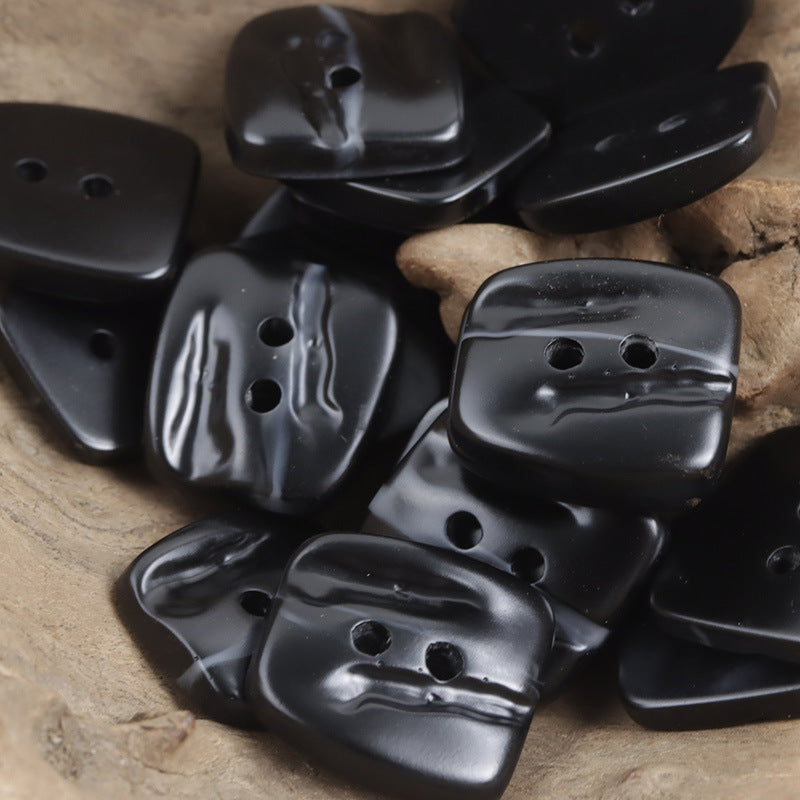 Trapezoidal 2-hole resin buttons with uneven surface, black color pile