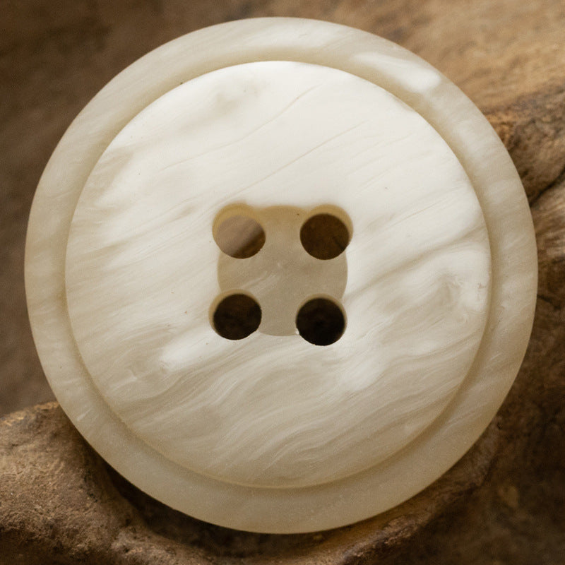 Resin wood-grain button, creamy white, four-hole phoenix groove design