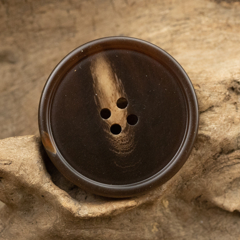 Red brown round resin coat button with imitation horn texture and 4 holes