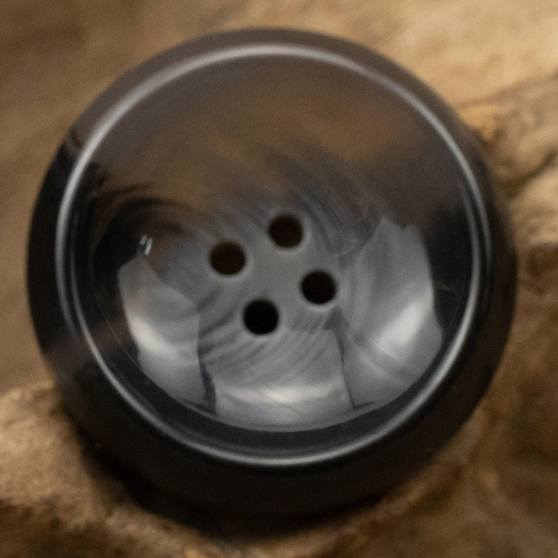 Black round 4-hole resin suit button, bowl-shaped, glossy finish