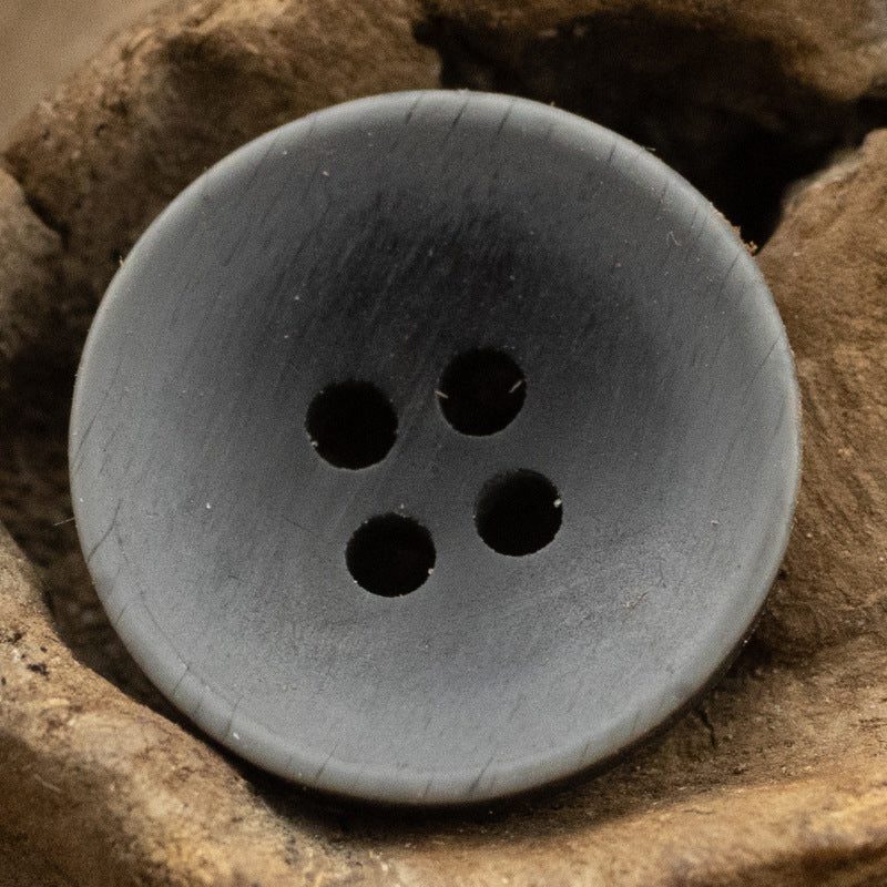 Matte resin button, dark gray, 4-hole front view