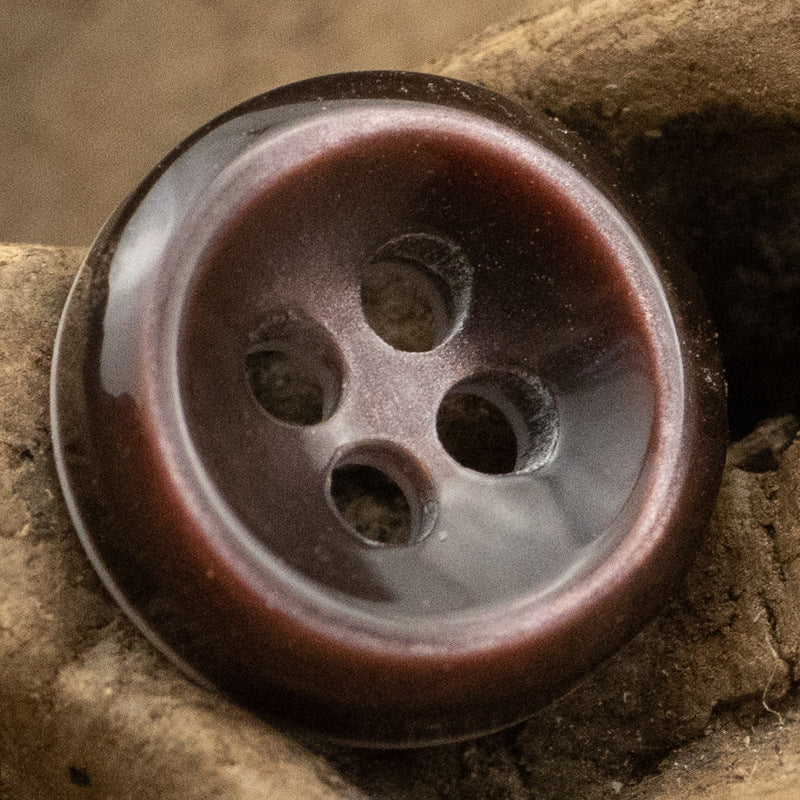 Wine-brown pearlized resin button with 4 holes, beveled edge
