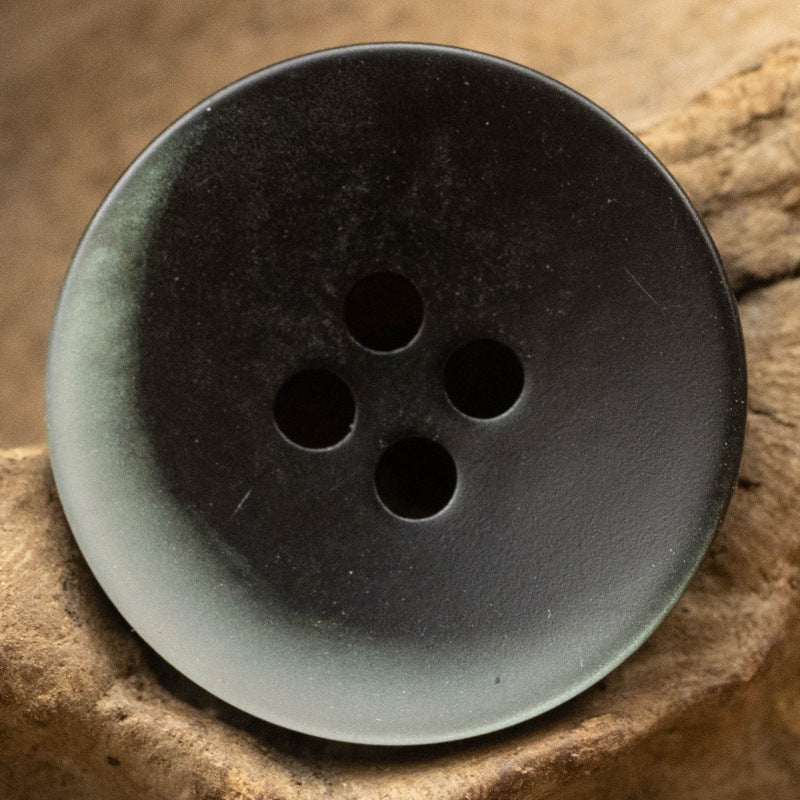 Black-green tinted resin button, flat with 4 holes