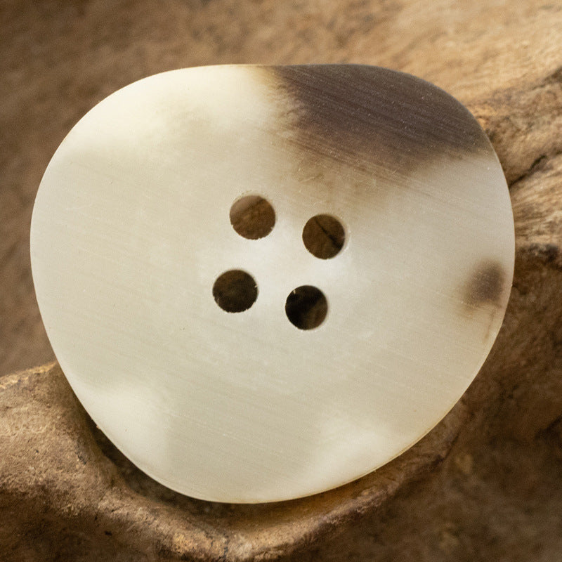 Peach-shaped resin buttons in white, 4 large holes