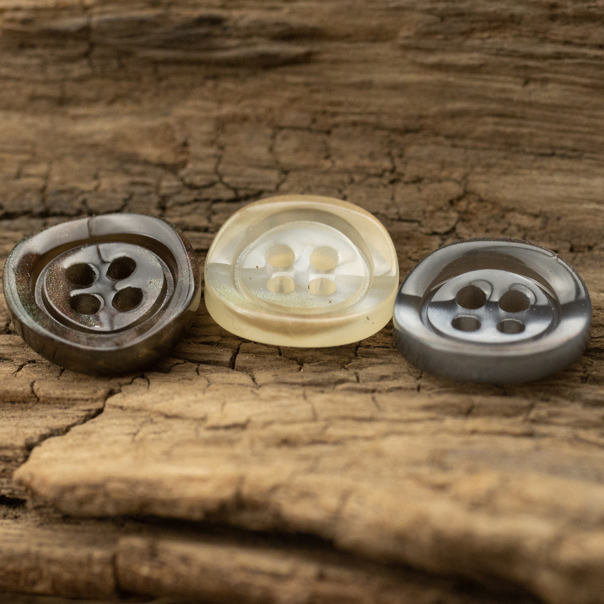 Set of translucent glazed pearl resin buttons: silver-gray, khaki, dark, four-hole front