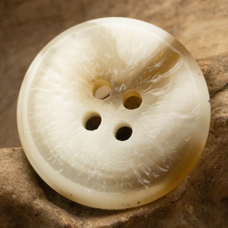 Uneven-surface resin button, cream/ivory color, four-hole design