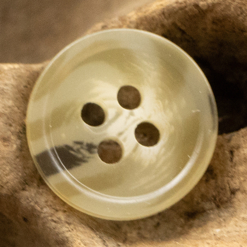 Translucent light yellow round resin button with 4 holes, 11.5mm