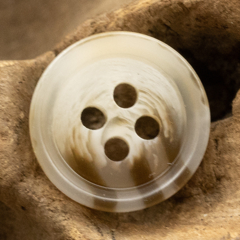 Light resin round button with 4 holes, 11.5mm, translucent white tone
