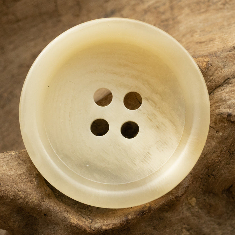 Cream resin button, round with four holes