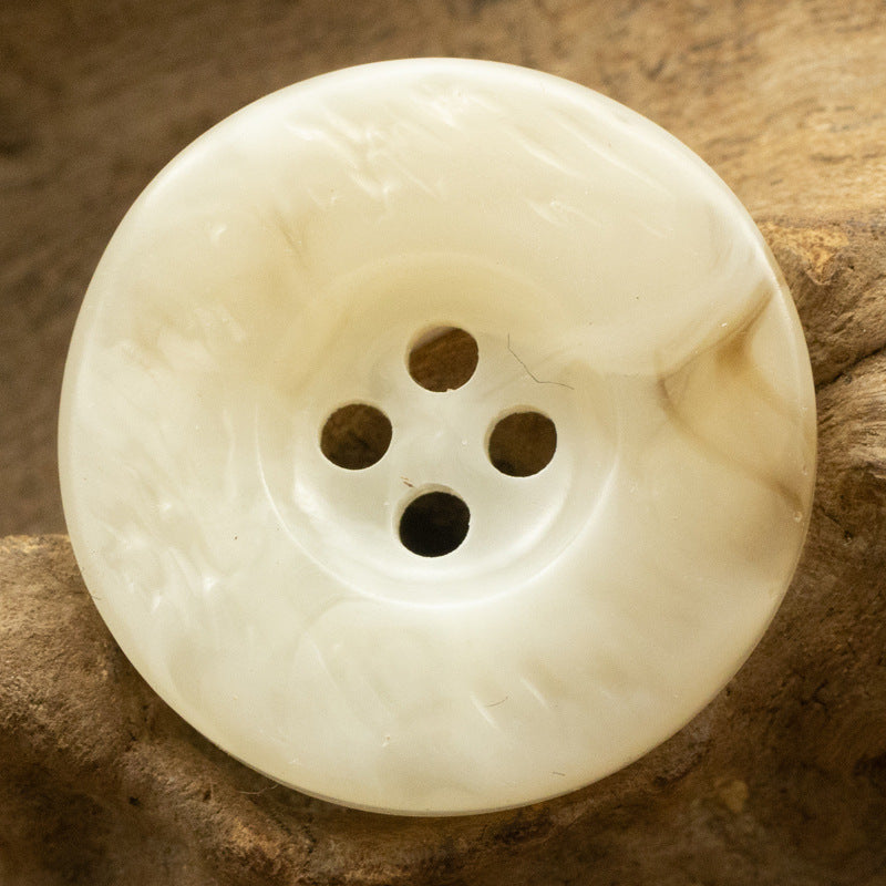 White resin button, thickened irregular curved design, 4-hole, subtle texture
