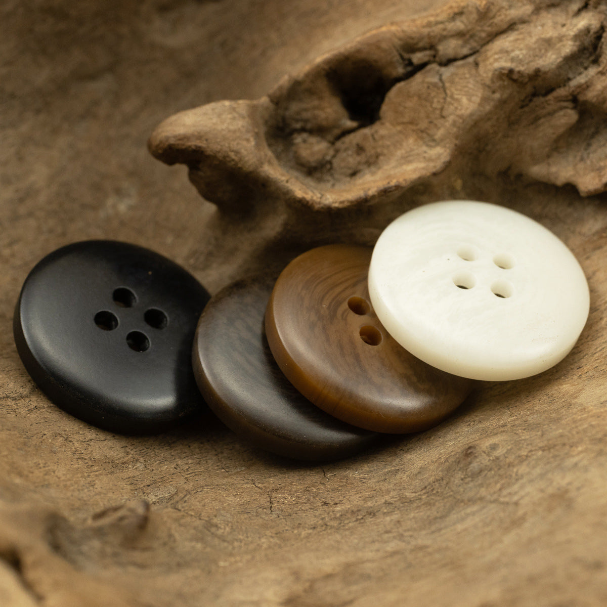 Resin coat buttons, dark brown and black, round wide edge, four holes