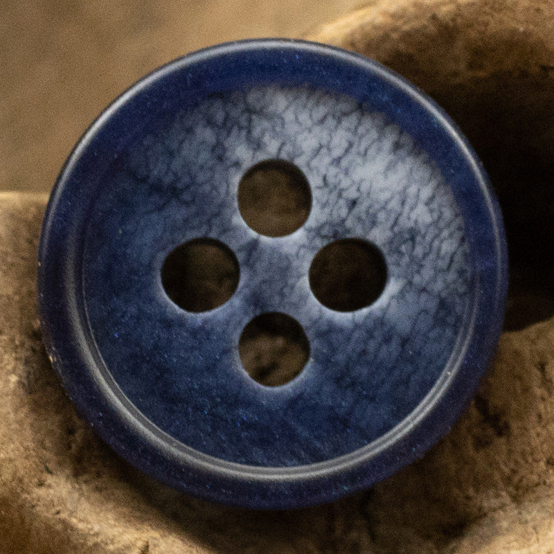 Deep blue 11.5mm resin button with 4 holes and speckled printed pattern