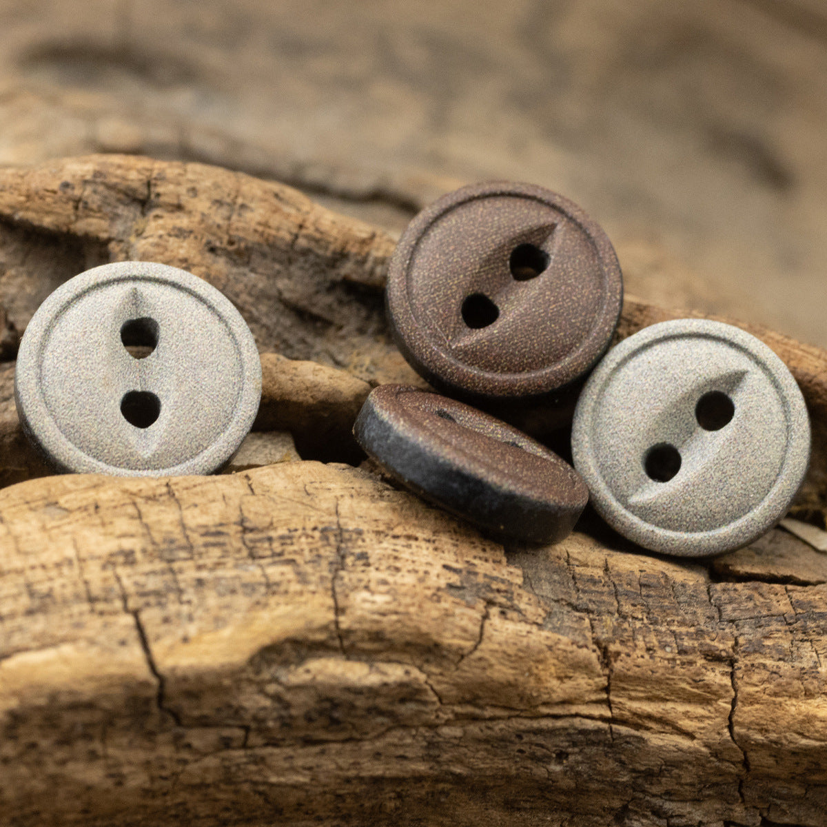 Light gray speckled resin buttons with two holes, round design set
