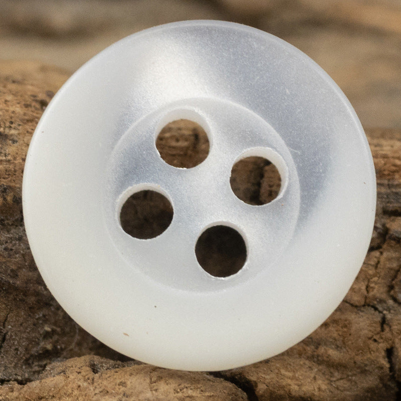 White resin button, 4 holes, close-up front