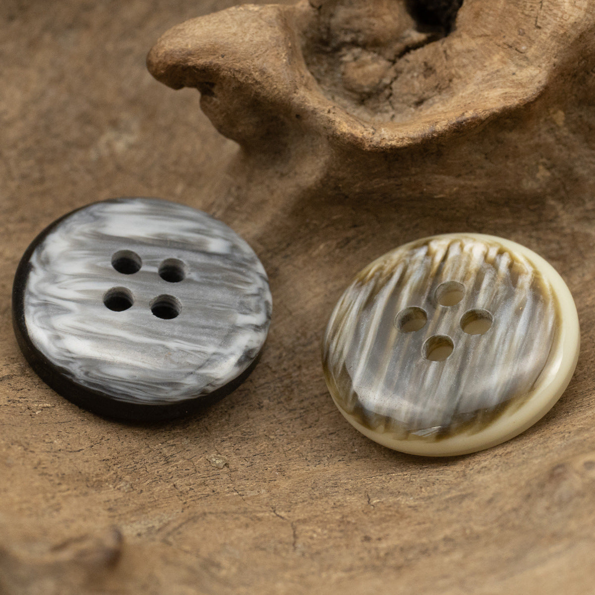 Gray and cream round 4-hole resin buttons, four holes each