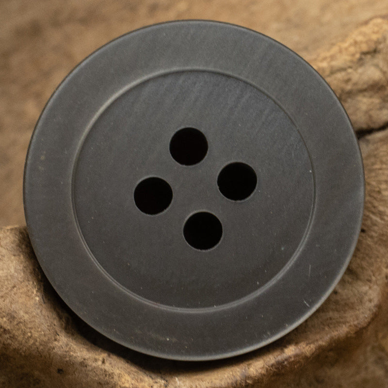 Gray round 4-hole resin button, matte finish with four holes