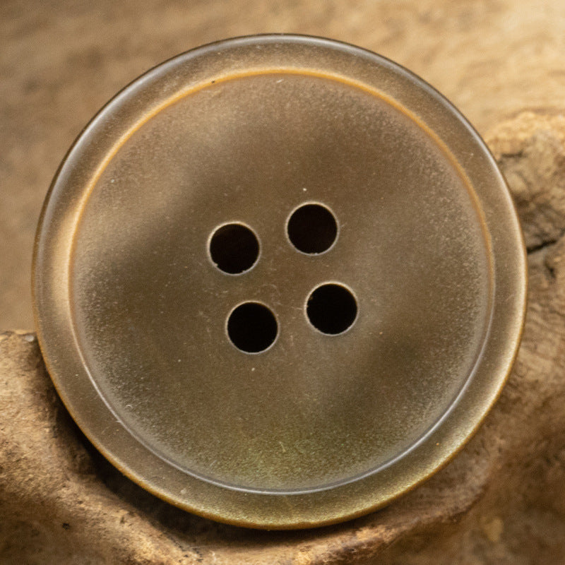 Coffee/tan resin 4-hole button with four dark holes
