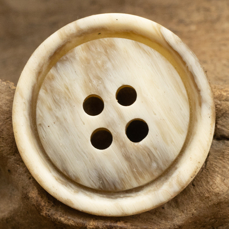 Round resin button, 4-hole, light cream distressed wood grain