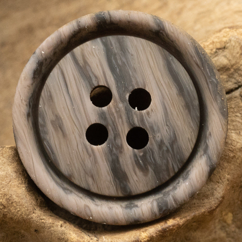 Round resin button, 4-hole, light wood grain with dark worn edge