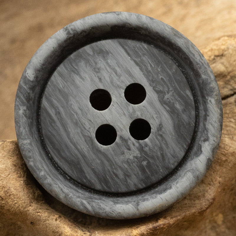 Round resin button, 4-hole, gray distressed wood grain texture