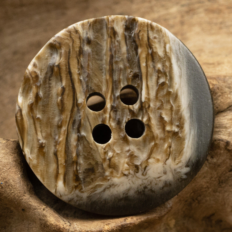 Coffee-brown resin button, irregular round with faux tree-bark texture and 4 holes