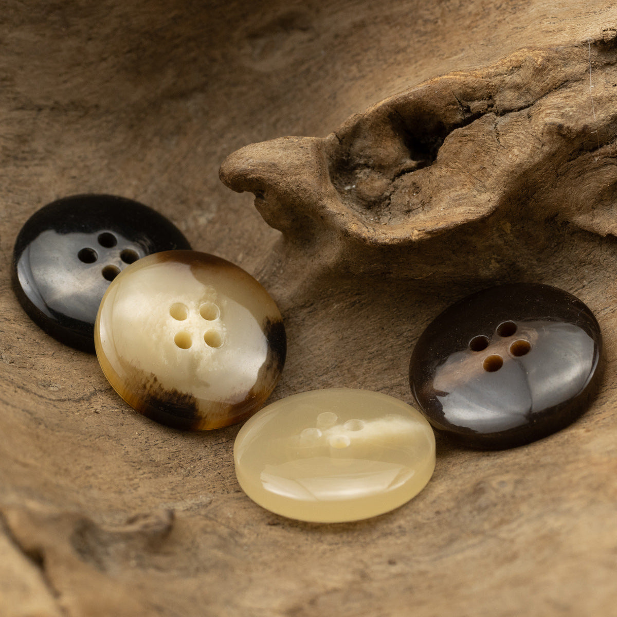 Resin buttons in yellow, dark brown and gray tones, 4-hole style