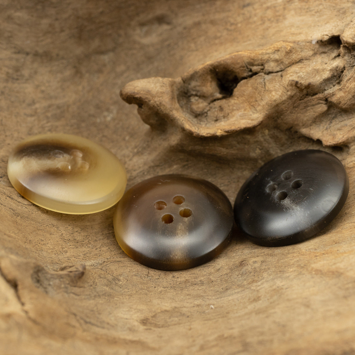 Three resin coat buttons, 4-hole design: pale amber, coffee brown, dark gray