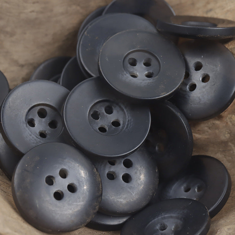 Black four-hole wide-edged resin buttons (set of 30), matte round design