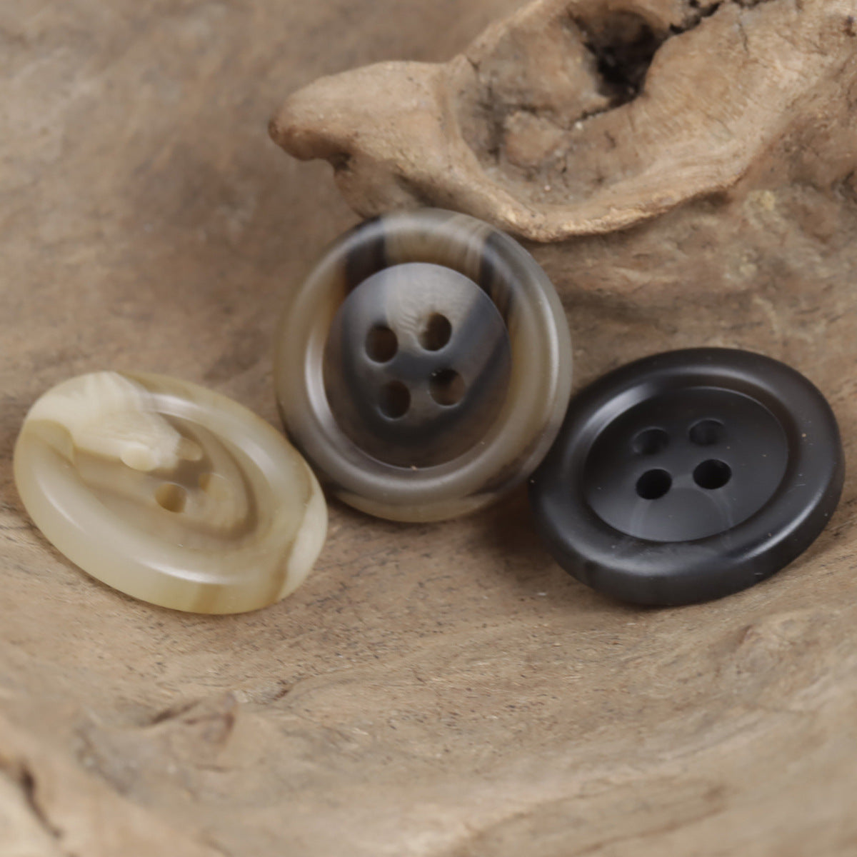 Resin buttons: light khaki, gray-brown, and dark gray, round 4-hole design