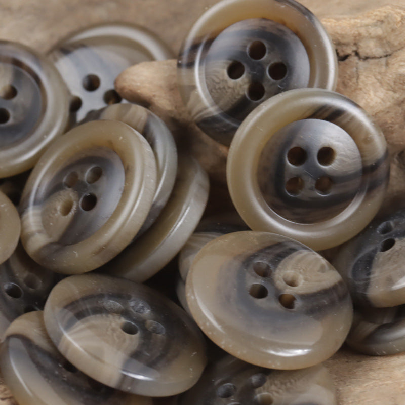 Resin buttons in light tan and dark gray, round 4-hole fronts