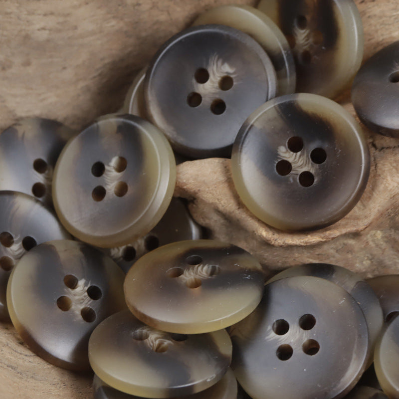 Matte resin buttons in gray-brown tones, round 4-hole