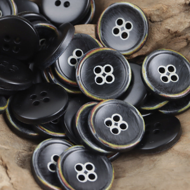 Mixed black and gray 4-hole round resin buttons with flower-shaped holes
