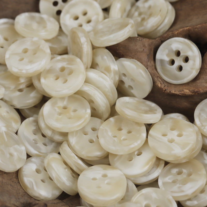 Cream/ivory round 4-hole resin buttons with marbled swirl, 11.5/12.5mm