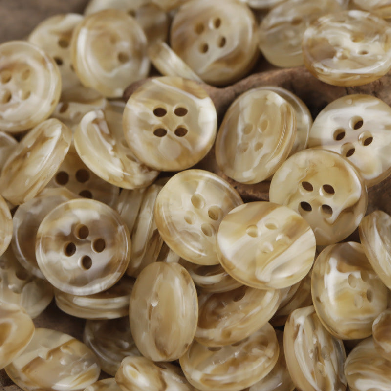 Light tan round 4-hole resin buttons with creamy marbled finish, 11.5/12.5mm