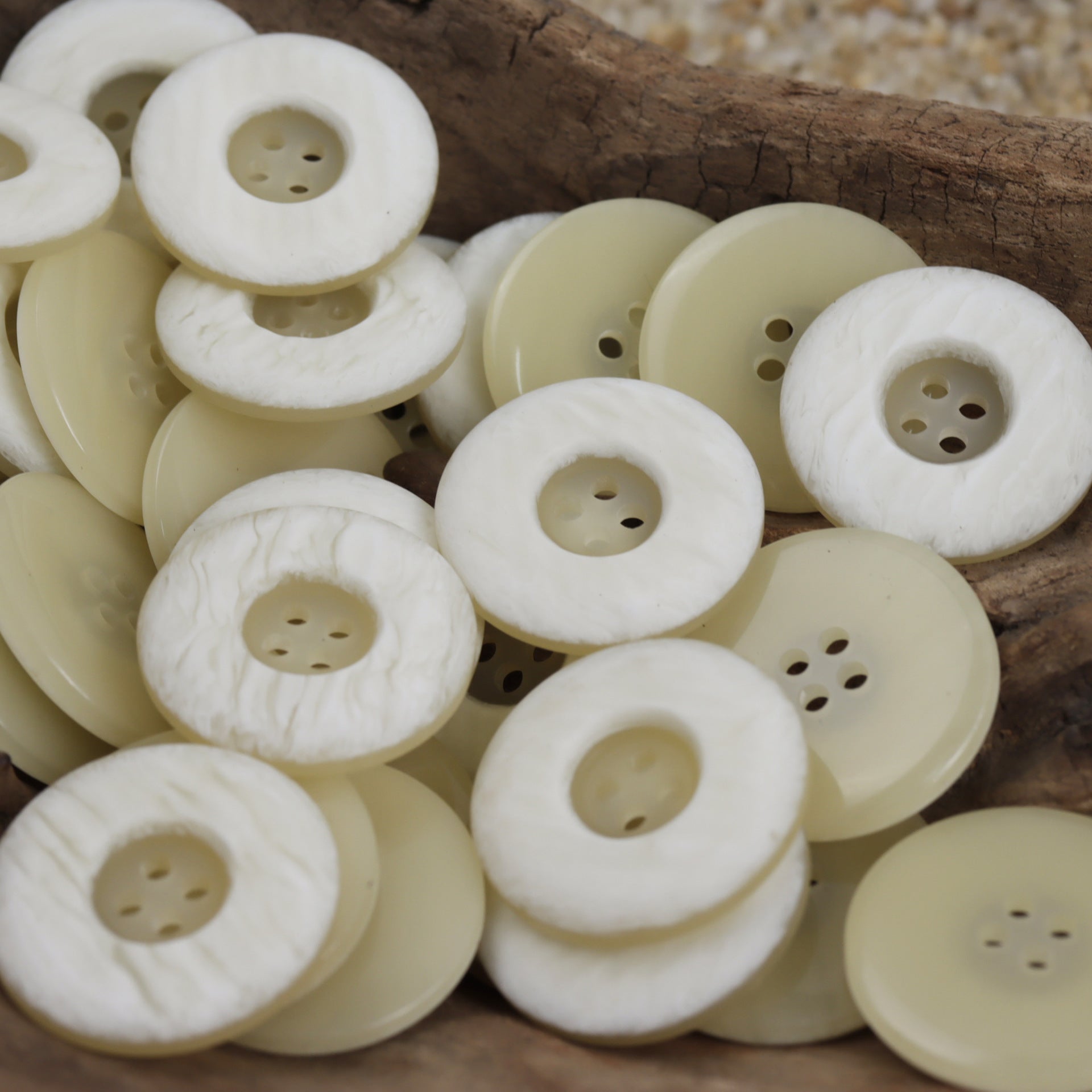 White two-tone resin buttons, round, 4-hole fronts, mixed finishes